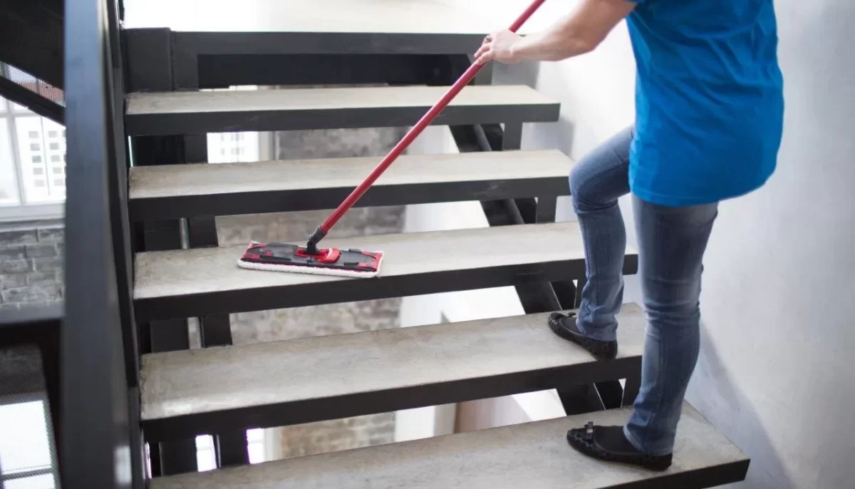 cleaning service woman clean stair at home in northbrook